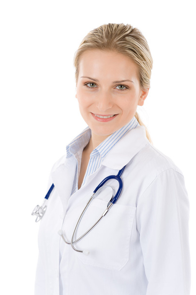 Young female doctor with stethoscope on white - 写真・画像