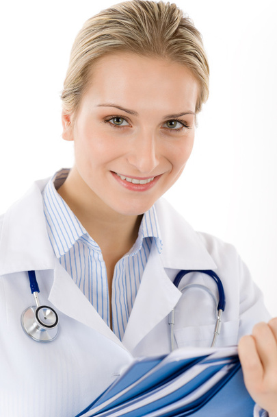 Young female doctor with stethoscope on white - Foto, imagen