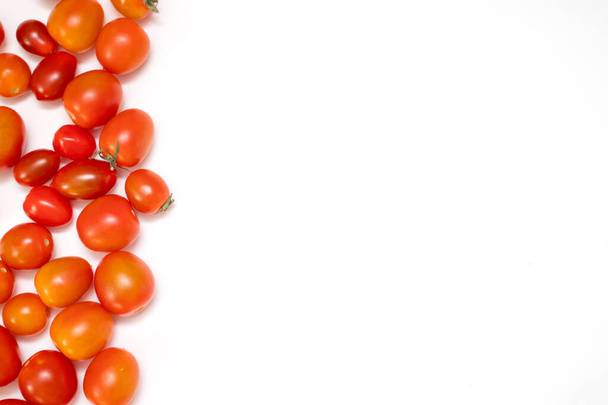 Background cherry tomato frame with white blank background. - Zdjęcie, obraz
