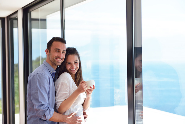 Relaxed young couple at home - Foto, Imagen