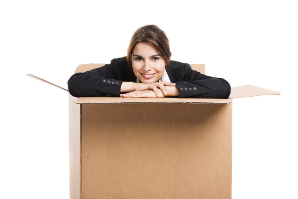 Business woman appear inside a big card box - Fotoğraf, Görsel