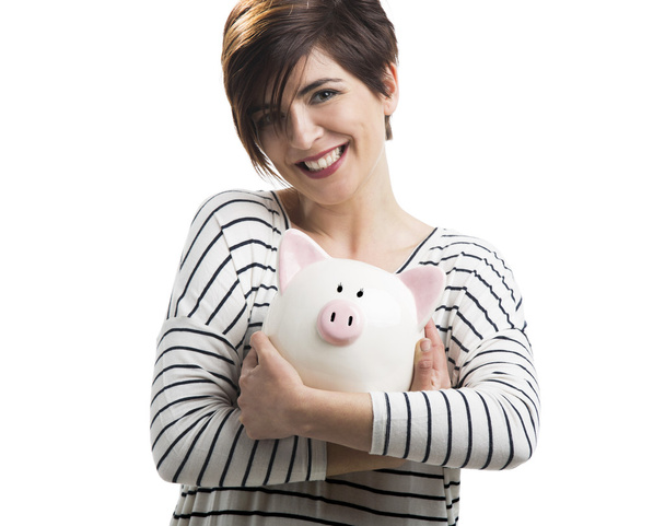 Woman with a piggybank - Foto, afbeelding