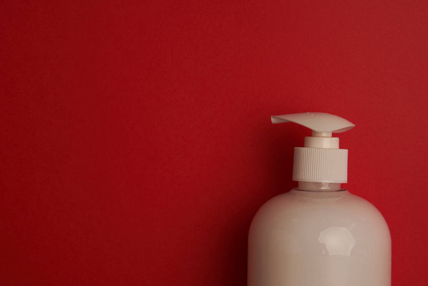 soap bath supplies hygiene body care red background - Valokuva, kuva