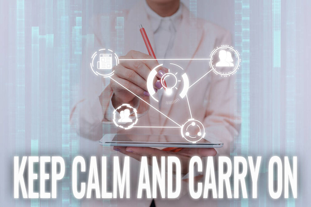 Sign displaying Keep Calm And Carry On. Business concept slogan calling for persistence face of challenge Lady In Uniform Touching And Using Futuristic Holographic Technology. - Photo, Image