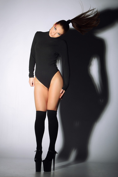 Brunette in black leotard - Фото, зображення