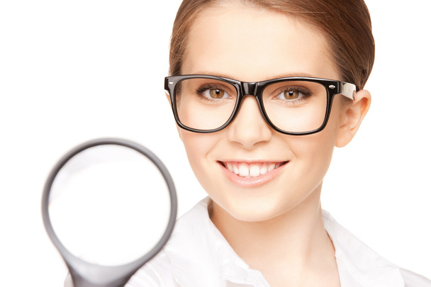 Woman with magnifying glass - Foto, imagen