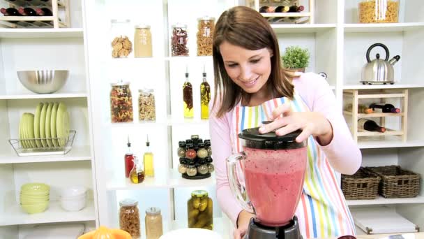 Caucasian Girl Making Healthy Homemade Fruit Smoothie - Footage, Video