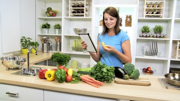 Caucasian Girl Using Recipe Wireless Tablet Healthy Living - Footage, Video