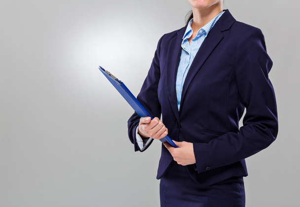 Businesswoman hold with clipboard - 写真・画像