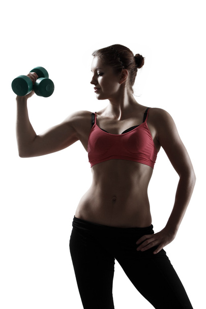 Sport woman doing exercise with dumbbells - Foto, imagen