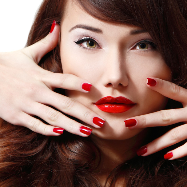 Woman with long hair, red lipstick and manicure - Photo, Image