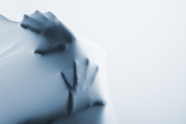 Abstract hands, human arm inside fabric - Photo, Image