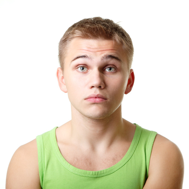 Young man emotional pensive sad face - Фото, зображення