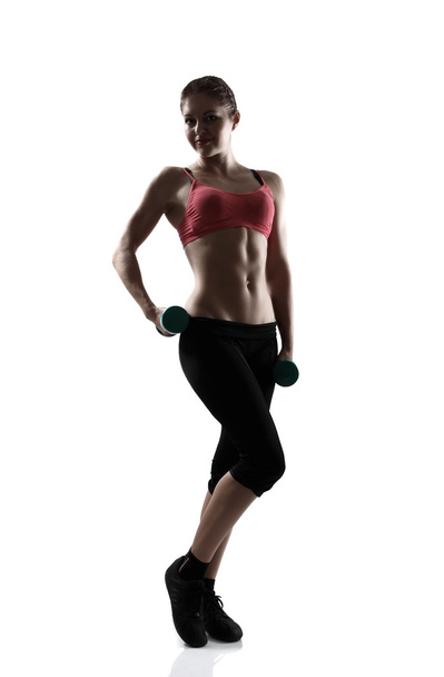Sporty girl with dumbbells - Foto, imagen