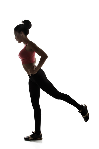 Sport young  woman doing legs exercise - Valokuva, kuva