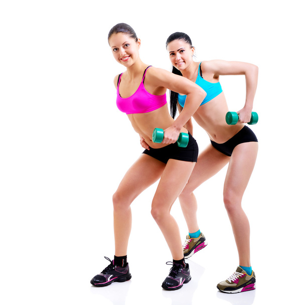 Fitness girls over white background - Photo, Image