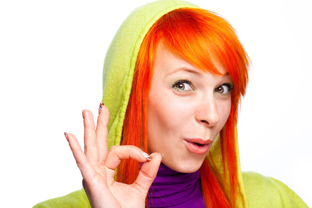 Smiling red hair woman showing ok sign - Foto, afbeelding