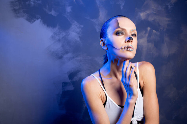  Portrait of beautiful woman with bright halloween makeup - Photo, image