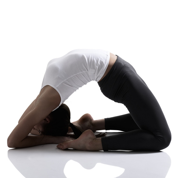 Girl doing yoga - Фото, изображение