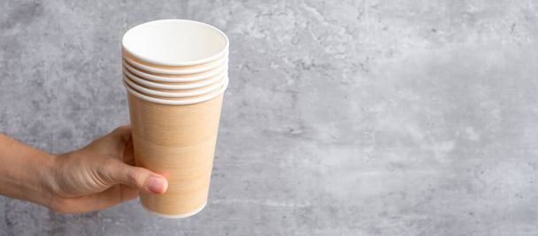 Eco friendly food packaging or takeaway coffee cup. Hand holding natural container for to go. zero waste, pollution, earth day, free plastic, world Environment day concept - Photo, Image