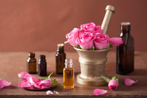 spa and aromatherapy set with rose flowers mortar essential oils - Photo, Image