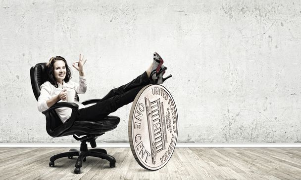 Businesswoman sitting bossy in chair - Фото, изображение
