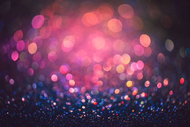 bokeh effect glitter colorful blurred abstract background for birthday, anniversary, wedding, new year eve or Christmas. - Fotó, kép