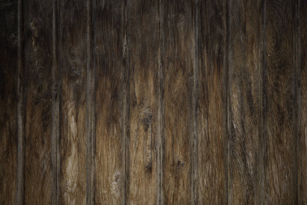 Een close-up van een houten muur - ideaal voor achtergrond of behang - Foto, afbeelding