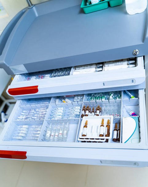 Medical equipment in special shelves. Professional medicine technology treatment. - Photo, Image