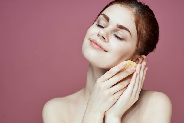 woman with bare shoulders sponge in hands clean skin hygiene - Photo, Image