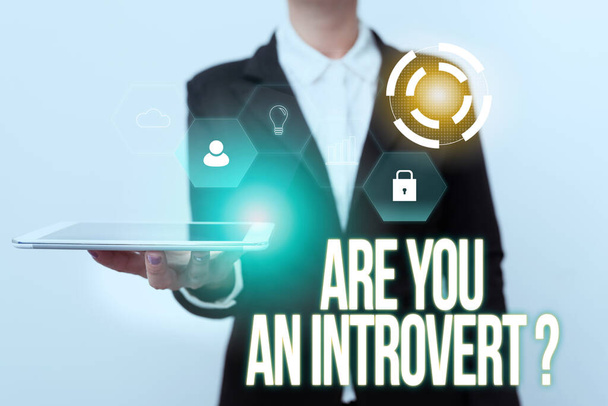 Sign displaying Are You An Introvertquestion. Business showcase person who tends to turn inward mentally Woman In Uniform Displaying Mobile Device Futuristic Virtual Tech. - Photo, Image