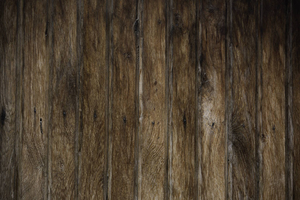 A closeup shot of a wooden wall - great for background or wallpaper - Photo, Image