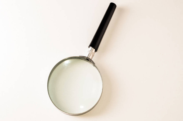 A closeup shot of a magnifier isolated on a white background - Valokuva, kuva