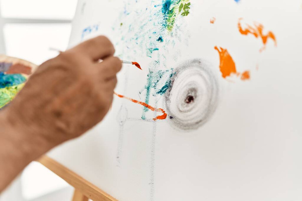 Senior artist man painting at art studio. - Zdjęcie, obraz