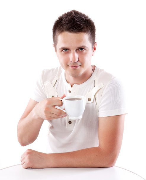 Man with cup of tea - Фото, изображение