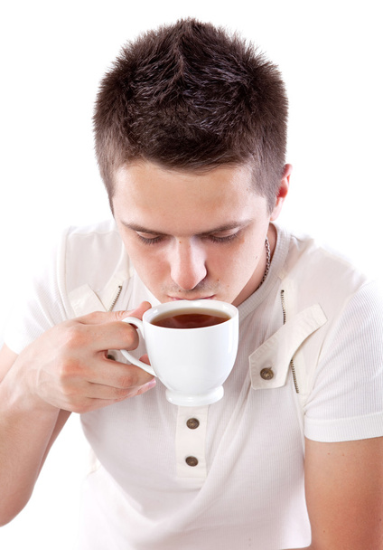 お茶のカップを持つ男 - 写真・画像