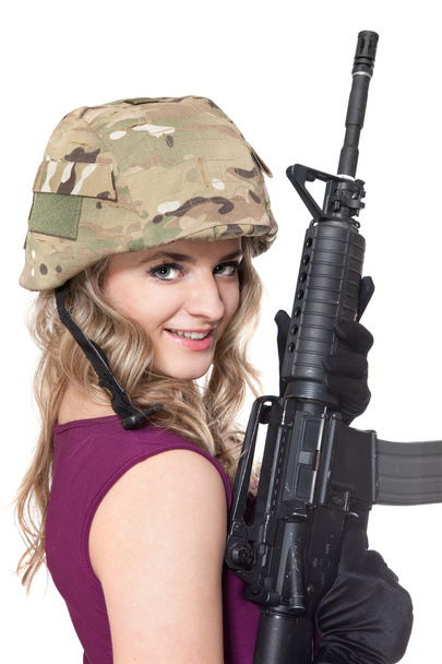 Beautiful woman with rifle - 写真・画像