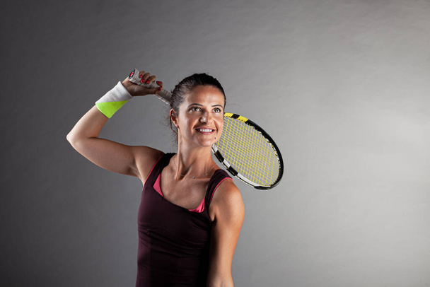 Professional female tennis player. Girl with racket and ball.. - Foto, Imagen