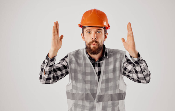 emotional man Construction industry work hand gestures light background - Photo, Image