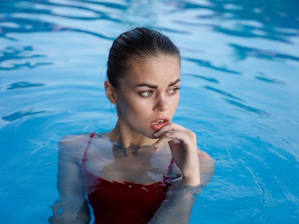 attractive woman in the pool. High quality photo - Φωτογραφία, εικόνα