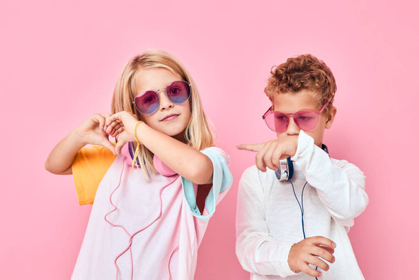 trendy boy and girl blonde hair fashionable glasses Childhood lifestyle concept - Photo, Image