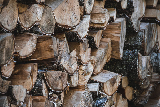 A closeup shot of cut tree logs stacked on each other - for backgrounds - Fotó, kép
