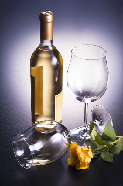 Wine, glasses, and placed decoratively illuminated. - Photo, Image
