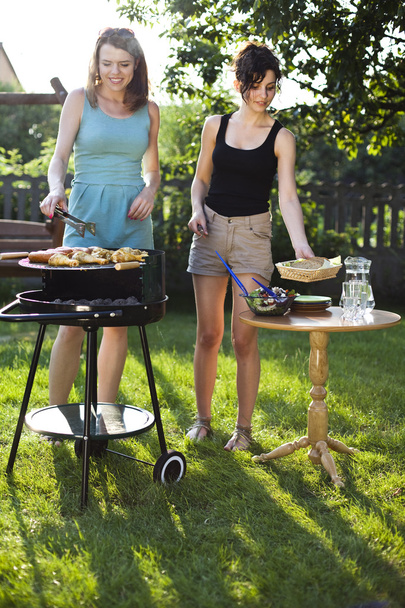 Girls making food on grill - Photo, Image