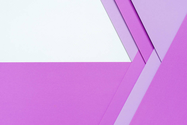 abstract background idea Layers of different hues of purple are layered in layers with a light shadow on a white and purple backdrop, excellent for use as a design element or website cover design ideas. - Foto, afbeelding