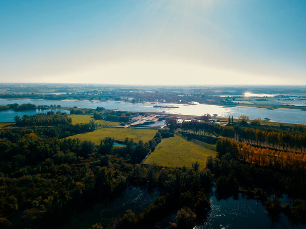 Aerial drone view of the landscape near the Waal river in the Netherlands Europe. - Fotó, kép