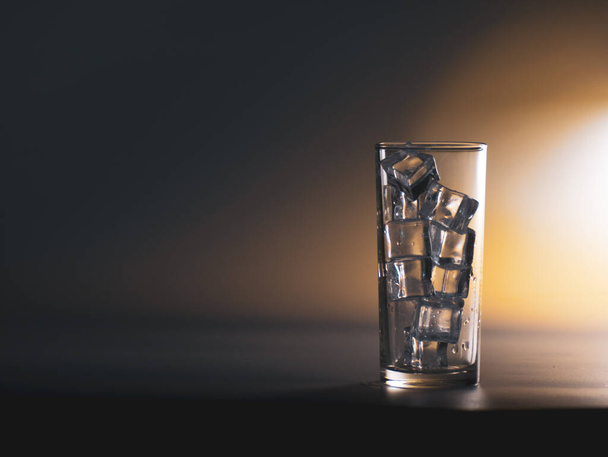 A glass of clean drinking water with ice. Healthy drinking water concept - Фото, изображение