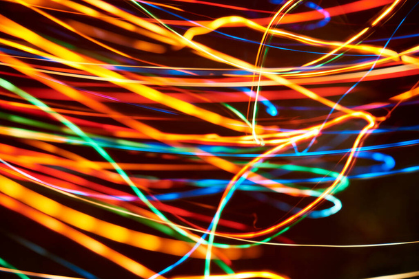 Abstract dynamic background, colorful light lines. Concepts of motion, energy and vitality. - Фото, зображення