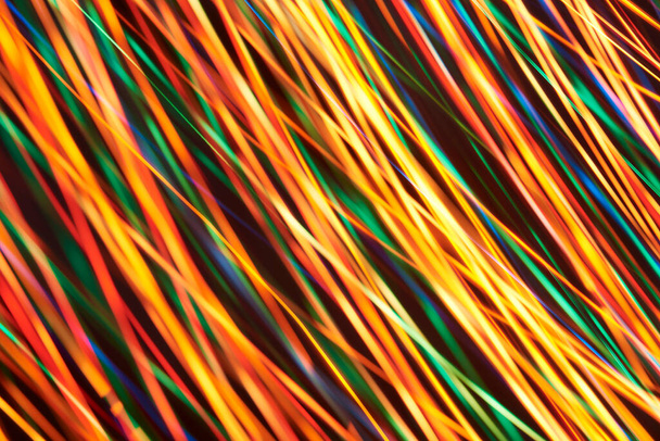Fundo dinâmico abstrato, linhas de luz oblíquas multicoloridas. - Foto, Imagem