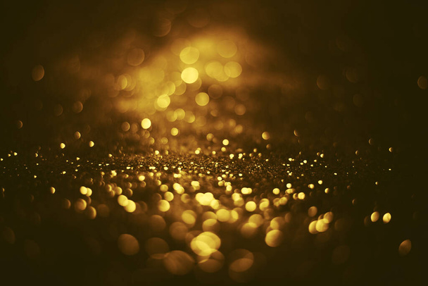 Золотий блиск текстури боке освітлення Розмитий абстрактний фон на день народження, ювілей, весілля, переддень Нового року або Різдво
 - Фото, зображення